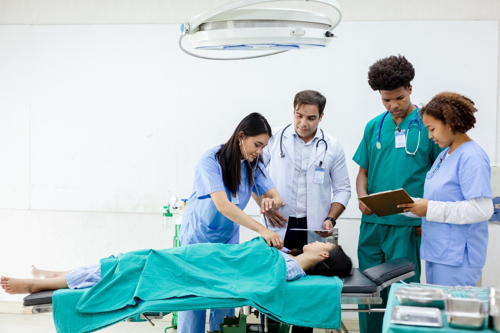 Medical students learning clinical skills with an instructor
